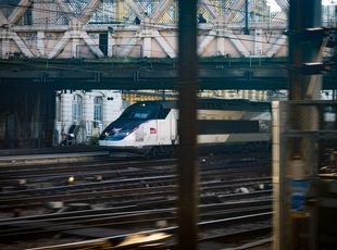 TGV Réseau unit 555 going through the tracks in Paris